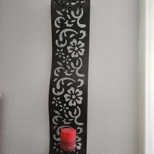 Black Metal Wall Sconce with Red Candle